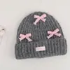 Chapéu de Lã Tricotado com Laço Dopamina Coreano para Mulheres, Outono e Inverno, Quente, Grosso, Protetor de Orelhas, Valoriza o Rosto, Gorro de Estudante