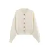 Za2025 Nuevo Conjunto de Chaqueta de Punto con Botones de Flor de Vainilla para Mujer + Minifalda Plana