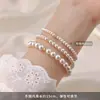 Pulsera Perla Crema Redonda Perfecta con Cuentas Elegante Moda Lujo Accesible Nicho Elegante Francés Alta Gama Pulsera Cordón Elástico