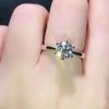 Presente de casal transfronteiriço Simulação de diamante Zircão Anel de abertura Feminino Design de nicho simples Saída de fábrica de seis garras