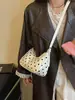 Bolso de lunares de nicho moderno para mujer, nuevo bolso cruzado versátil de color blocking de moda 2026, bolso de mano súper popular