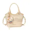 Primavera 2026 Novo Estilo Coreano Fashionável e Único para o Trabalho Estilo Simples Bolsa de Mão Tipo Balde Elegante Casual Bolsa Transversal