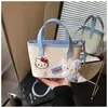 Bolso Cubo Rosa de Dibujos Animados Estilo Coreano para Mujer 2026 Nuevo Modelo Bolso de Mano Bolso Cruzado Bolso de Hombro de Alta Gama para Viajes