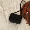 Bolso de Textura de Alta Gama para Mujer 2025 Nuevo Versátil Moderno Estilo Retro Bolso Cuadrado Pequeño Color Sólido Bolso de Hombro Único Bandolera