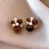 Brincos Olho de Tigre Estilo Melanoid Retro Senso de Design de Nicho Brincos Versáteis Luxo Leve Moda de Alta Qualidade Brincos de Tarraxa para Mulheres