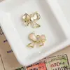 Una Variedad de Colgantes de Lazo de Aleación Dulces y Frescos Joyería Hecha a Mano DIY Collares de Mano Pendientes Colgantes Accesorios Materiales