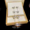 Pendientes de Borla de Circonita Super Brillantes Aguja de Plata Elegantes de Alto Grado Dulces Versátiles Pendientes de Mariposa de Lujo Ligero de Moda para Mujeres
