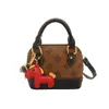 Bolsa de Mão Mini Tendência com Design de Nicho Vintage Nova Primavera 2026 Bolsa Concha Transversal Feminina Porta-Moedas de Batom