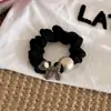 1. Goma para el pelo vintage de flores oscuras con una textura madura y suave, adecuada para ir al trabajo, accesorio para el cabello duradero y versátil para mujeres