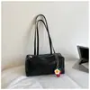 Nuevo bolso de axila coreano de nicho transfronterizo para mujer, bolso Boston de axila moderno y texturizado, bolso de hombro casual para el día a día