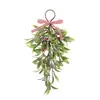 Decoración colgante de muérdago artificial flocado simulado más vendida transfronteriza, venta al por mayor desde la fábrica de origen, colgador de puerta de Navidad con lazo de frutos rojos