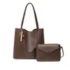 Bolsa tote de alta gama de gran capacidad para mujer, nuevo modelo transfronterizo con patrón de lichi, juego de dos piezas para el uso diario, bolsa de hombro y para el antebrazo