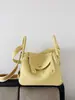 Capa Superior Piel de Vaca Togo Lindy Bolso de Piel Genuina para Mujer 2025 Nuevo Retro Europeo y Americano Bolso Cubo Moda Mano Bolso de Piel Genuina para Mujer