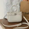 Bolso plateado para mujer 2026 nuevo de moda primavera-verano bolso de mano de alta gama bolso tipo cubo para el uso diario bolso de hombro y cruzado