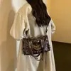Bolso de mano tipo almohada estilo ins hot girl coreano, bolso de hombro cruzado estilo biker simple retro de alta moda, bolso para el día a día