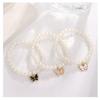 Conjunto de joyería para dama con diseño de mariposa y perlas transfronterizas, pulsera, pendientes, collar y anillo, disponible al por mayor.