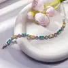 Pulseira Redonda Vazada Europeia e Americana de Moda Transfronteiriça Banhada a Ouro Inlaid Zircônia Joia de Mão Moda Feminina Versátil Colorida Luxo Leve