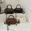 Bolso Retro Simple y Versátil para Mujer 2025 Invierno Nuevo Estilo Lujo Accesible Bolso de Hombro Cruzado Tipo Bowling de Gama Alta