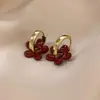 Elegantes Pendientes de Flor Esmaltada Roja Ankora para Mujer, Diseño de Nicho con un Toque de Alta Gama, Pendientes de Botón y Accesorios para Orejas de Moda