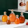 Venta Directa de Fábrica Sellado de Botella de Vino de Frutas Botella de Vidrio para Vino Casero Botella de Vidrio Creativa Botella de Vino Vacía Reenvasada Botella de Vino de Ciruela