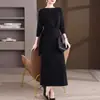 Coleção outono e inverno 2026 transfronteiriça: roupas da moda e estilosas para mães, com caimento relaxado, tamanhos plus, efeitos emagrecedores e um visual jovem, incluindo um conjunto de saia versátil