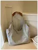 Nova bolsa de lona de verão, bolsa tote estilosa com grande capacidade, bolsa de ombro bordada em cor sólida para o dia a dia, bolsa de axila elegante e moderna