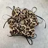 Goma para el pelo con lazo y estampado de leopardo retro para mujer, estilo coreano, ligera y esponjosa, versátil para el uso diario, liga para el pelo, accesorio para el pelo