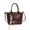 Bolso Pequeño Vintage Texturizado para Mujer 2025 Otoño Nueva Tendencia Bolso Cruzado Versátil Bolso de Mano Casual Tipo Cubo Bolso de Hombro