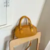 2026 Nueva Bolsa Almohada Versión Coreana Bolso Cuadrado Pequeño Bolso con Patrón Tejido Textura Elegante Color Sólido Bolso Vintage de Hombro Cruzado