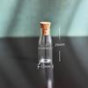 Se puede configurar un conjunto de accesorios para botellas de deseos, un colgante de corcho transparente para botellas a la deriva, un colgante de joyería DIY, una variedad de mini botellas pequeñas