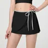 Falda Deportiva Antirreflejos para Mujer Bloque de Color Falsa de Dos Piezas Falda con Cordón Tenis Deporte Secado Rápido Bolsillo Falda de Yoga