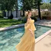 Vestido de tirantes amarillo de gasa de manga corta, único y hermoso, estilo francés, perfecto para fotos, con una falda escalonada de aspecto de hada