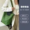 Mochila minimalista de lona de nylon de alta gama con logotipo personalizado para promoción de eventos corporativos y escolares