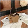 Bolso de mano para mujer estilo coreano transfronterizo 2026 nuevo bolso versátil bolso cubo retro simple bolso de hombro cruzado