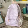 Mochila escolar transfronteiriça para meninas, mochila nicho e fofa para alunos do ensino fundamental II e médio, grande capacidade, alto valor estético, mochila de viagem doce para meninas jovens