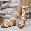 Comercio Exterior En Stock Sandalias Planas de Metal con Hebilla Hueca Verano 2026 Nuevas Botas Romanas de Tira Trasera Transfronterizas para Mujer