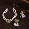 Collar y pulsera de perlas de imitación con flor de diamante francés, cadena de clavícula de nicho de moda, joyería de alta gama que combina con todo.