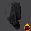 Pantalones deportivos de algodón para hombre para otoño e invierno, atados al tobillo, de color liso, versátiles, casuales, holgados, con forro polar, gruesos, ajustados