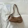 Bolso de axila de nicho coreano para mujer, nuevo bolso de mano de moda para el verano 2026, bolso de hombro elegante y atractivo para mujer