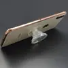 Soporte Adhesivo Transparente para Teléfono Móvil con Airbag Material Ultra-Transparente Soporte Plegable Telescópico Sin Línea de Molde Posición de Dedo Redondo