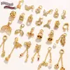 2026 Nuevo Modelo Cobre Chapado en Zirconio Oro Real 18K Cuentas Espaciadoras Cola de Pez Mariposa Campana Accesorios para Pulsera Collar DIY