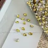 Pedras de strass para manicure douradas, modernas e deslumbrantes, apresentando designs de floco de neve, estrela de cinco pontas e cristal de vidro redondo com base pontiaguda, usadas como acessórios decorativos
