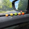 Decoración de naranja simulación decoración de coche interior de coche consola central superior de coche cosas buenas suministros de decoración de espejo retrovisor