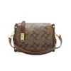 Elegante bolso pequeño para mujer, nuevo modelo 2026, bolso caja versátil de patrón clásico, bolso de mano para el trabajo, elegante bolso de hombro y cruzado