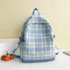 Mochila nueva de alta gama para estudiante de secundaria, bolso escolar premium para niñas, bolso de cuadros de nicho nuevo, mochila de gran capacidad para mujer