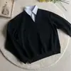 Sudadera negra de dos piezas de imitación con cuello de camisa para hombre, nuevo estilo primavera y otoño, chaqueta top tipo polo de manga larga de estilo universitario de alta gama