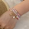 [Ice Meng] Pulsera de cuentas de arroz de moda con combinación de margaritas, joyería transfronteriza europea y americana B560