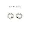 Pendientes compactos Love de plata de ley S925 bañados en oro de 14 quilates para mujer, estilo simple y frío, con diamantes, elegantes y combinables.