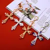 Llavero de coche con cruz de perlas incrustadas de diamantes, llavero de metal, colgante para bolso unisex, regalo creativo transfronterizo