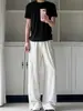 Calça casual masculina de outono estilo japonês, com design plissado, textura pesada, corte reto solto e efeito de caimento